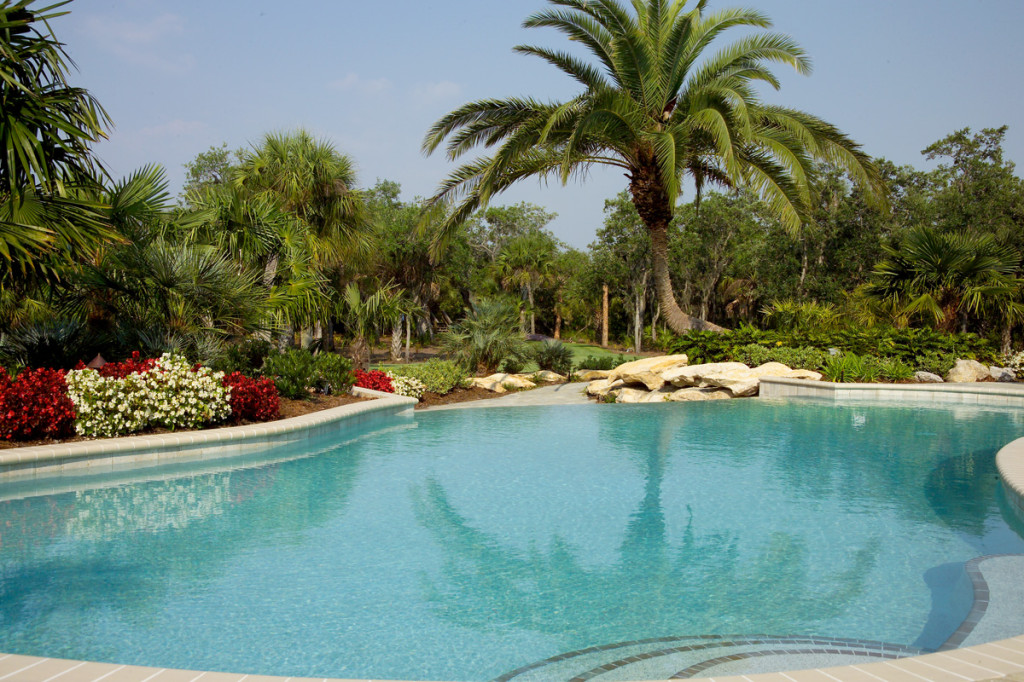 Lush landscape graces pool home in Osprey Florida.